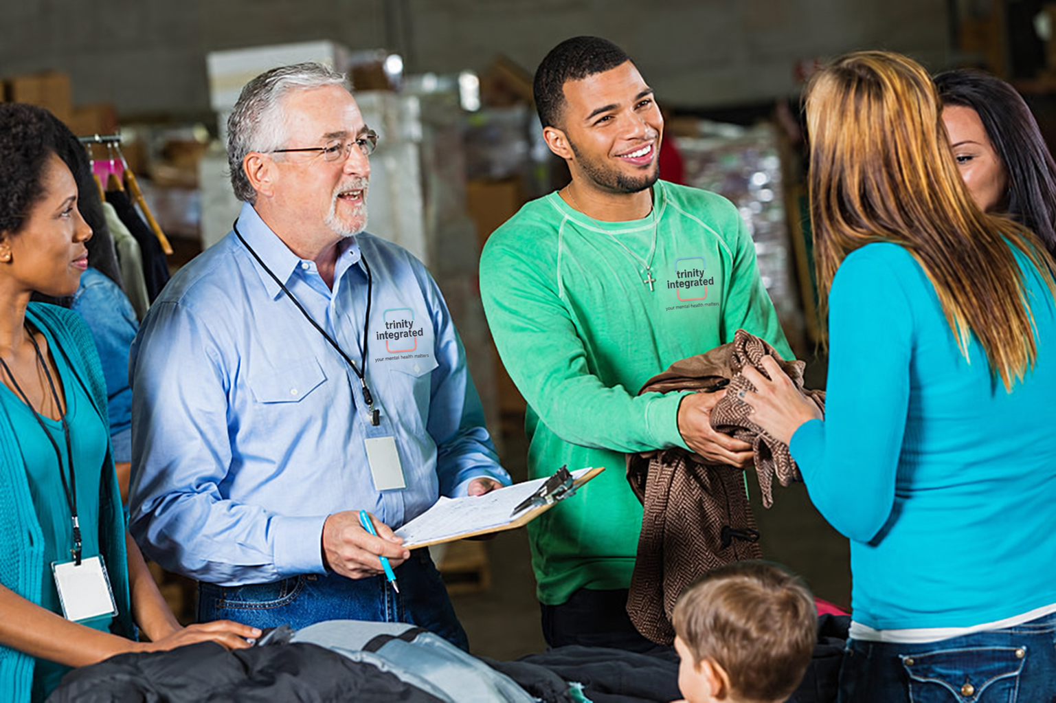 Volunteers helping distribute clothing